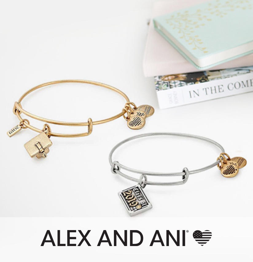 Alex and Ani Bracelets, next to text books; and a notebook
